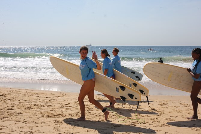 Australian Surfing and Camping Tours - Daily surf lessons with wetsuits, foam boards, and video feedback