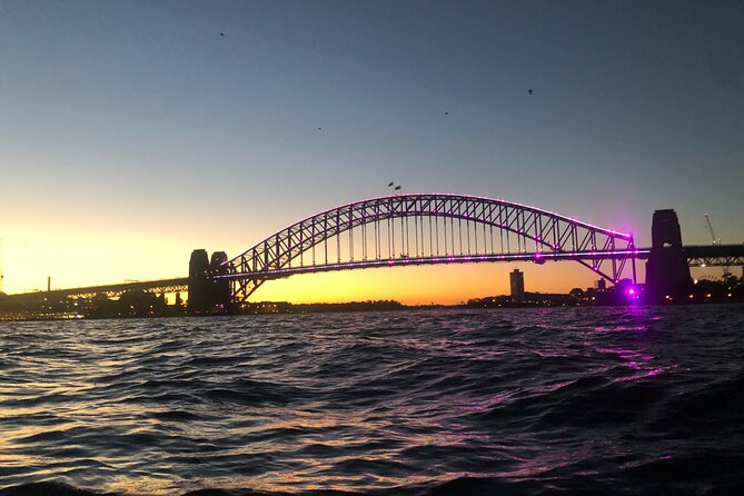 Sunset Paddle Session on Sydney Harbour (single kayak) - The Harbour Bridge stop: the skyline from the side, with light turning dramatic