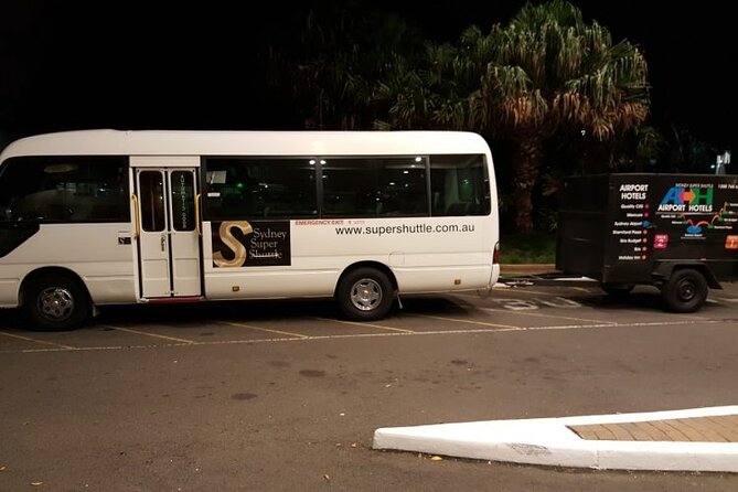 Sydney Airport to Sydney CBD shared ride seat in vehicle shuttle transfer - What happens after pickup: bag help and a real door-to-door feel
