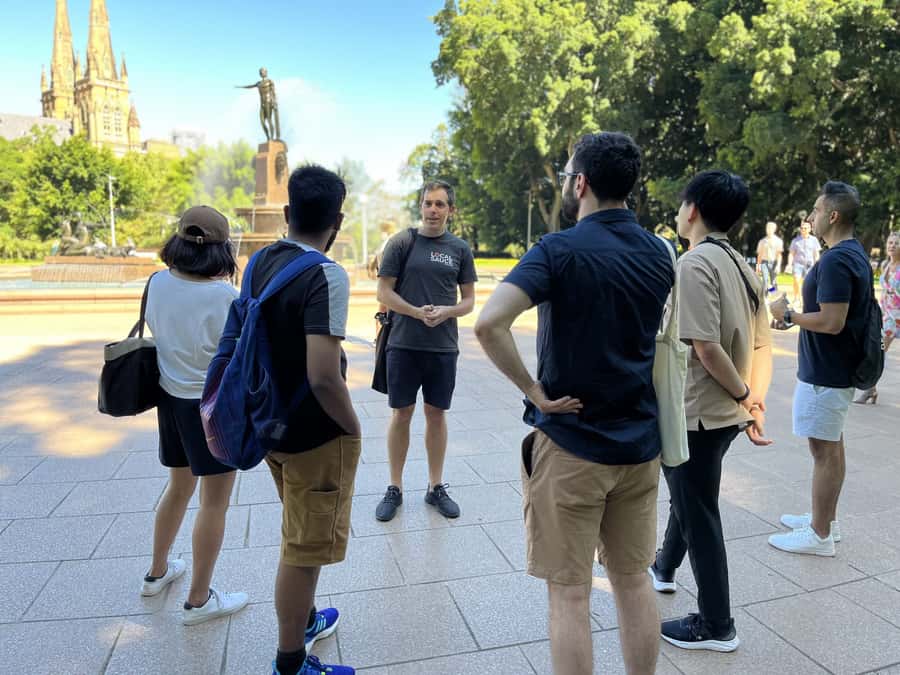 Sydney: City & The Rocks 3.5-Hour Walking Tour with a Drink - Queen Victoria Building and the Cenotaph: architecture, breaks, and remembering