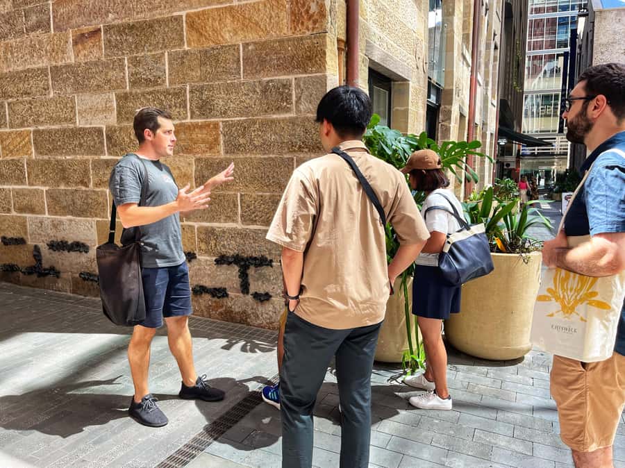 Sydney: City & The Rocks 3.5-Hour Walking Tour with a Drink - Angel Place to The Rocks: laneways, layers, and the First Nations thread
