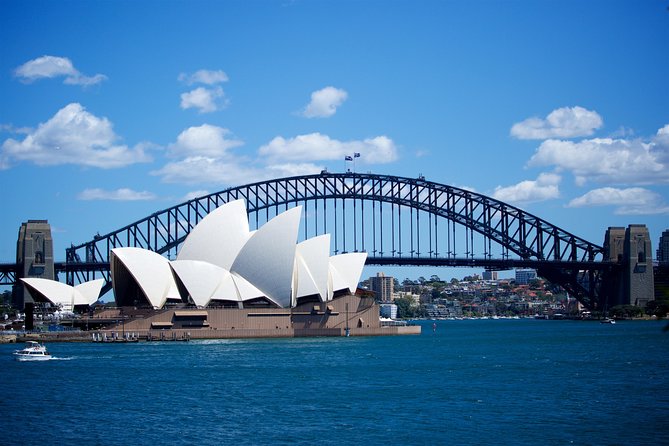 Sydney Coastal Escape | Private Mercedes Tour Sydney - Milsons Point and the skyline: quick, powerful harbour angles