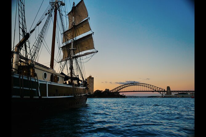 Sydney Harbour Tall Ship Twilight Dinner Cruise - A restored tall ship at twilight: what the sailing experience feels like