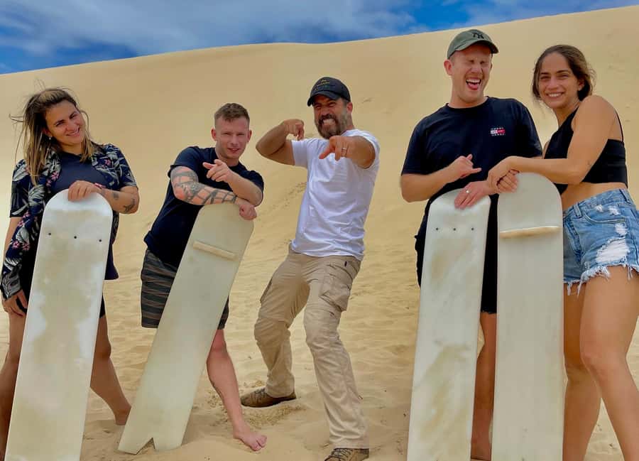 Sydney: Port Stephens Day Trip with Dolphin Cruise or Hike - Sandboarding: where the day turns from scenic to silly-fast